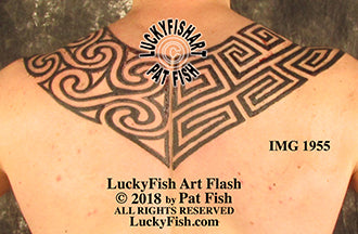 pictish arch geometric backpiece tattoo
